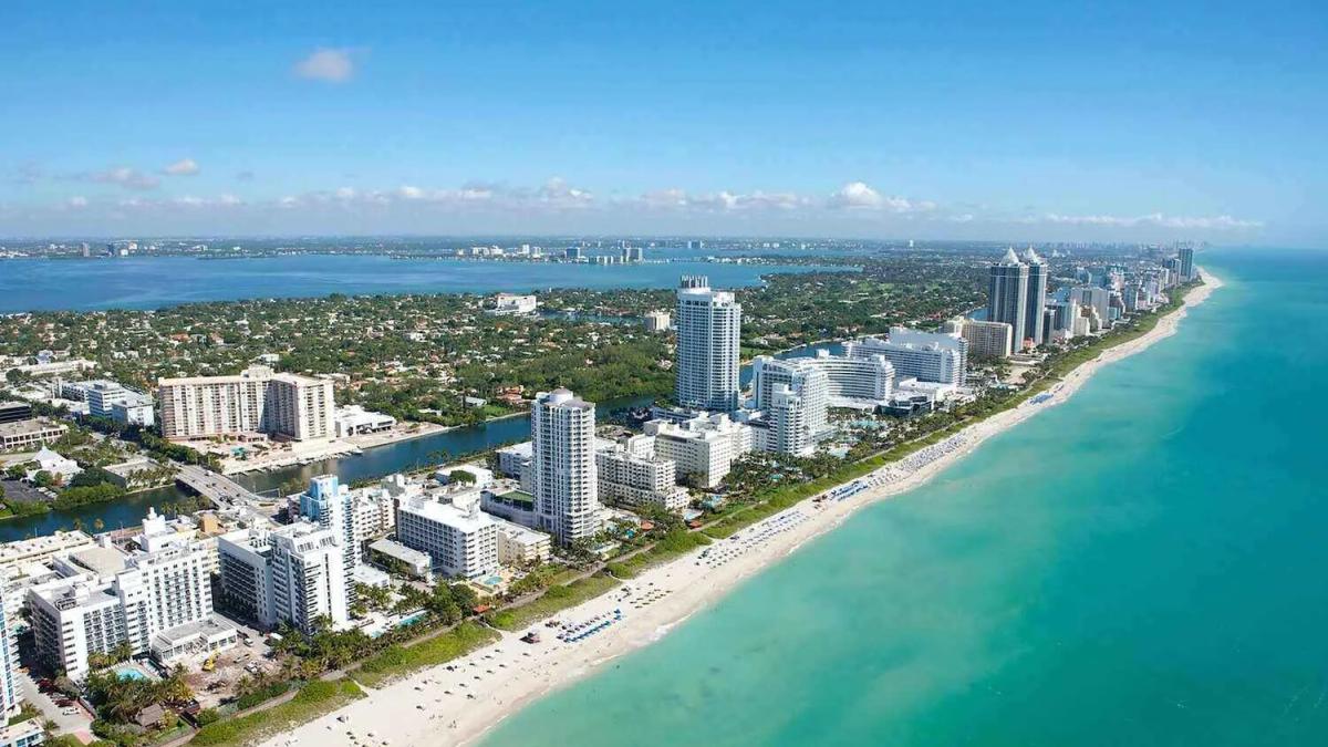 Miami skyline at sunset, reflecting the city's vibrant business growth
