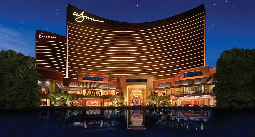 Wynn Resorts casino interior, luxurious gaming floor with slot machines and ornate decor