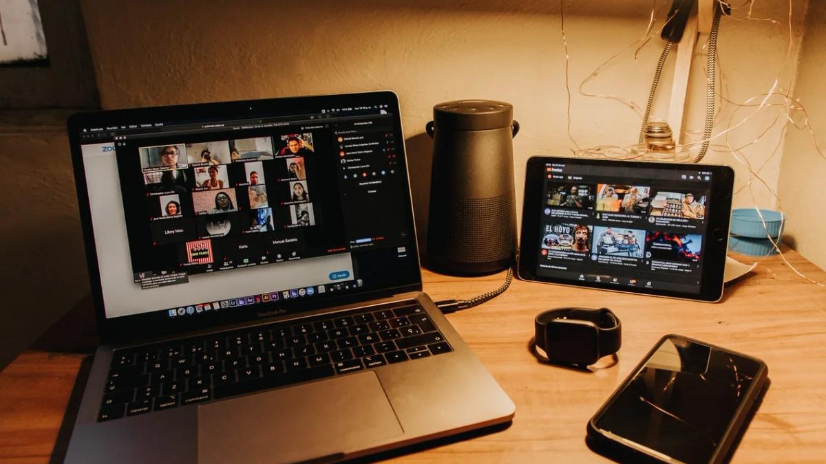 A diverse team collaborates virtually, navigating a challenging public relations crisis using Zoom